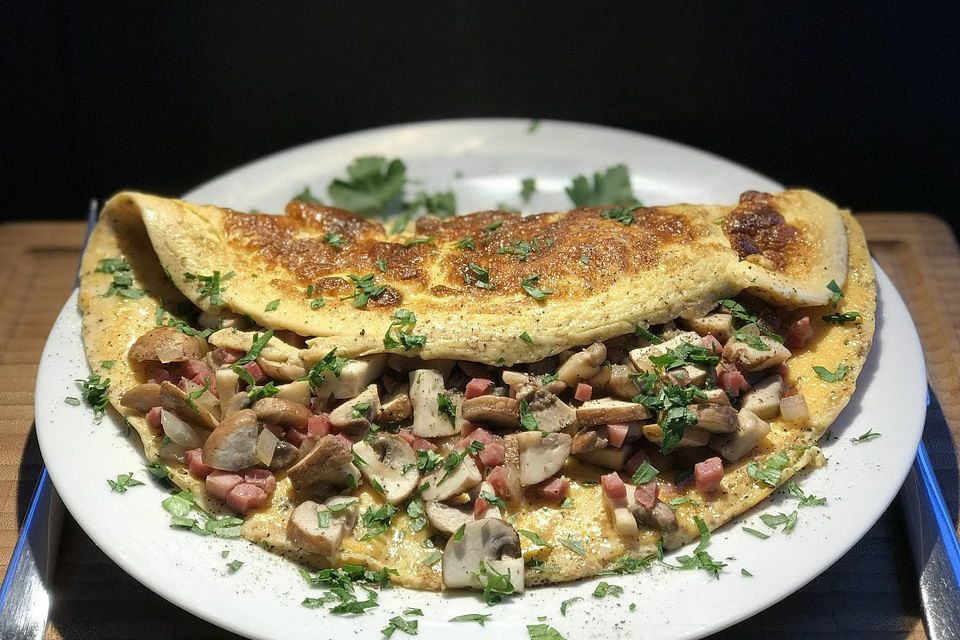 Omelette mit Pilzen und Schinkenspeck