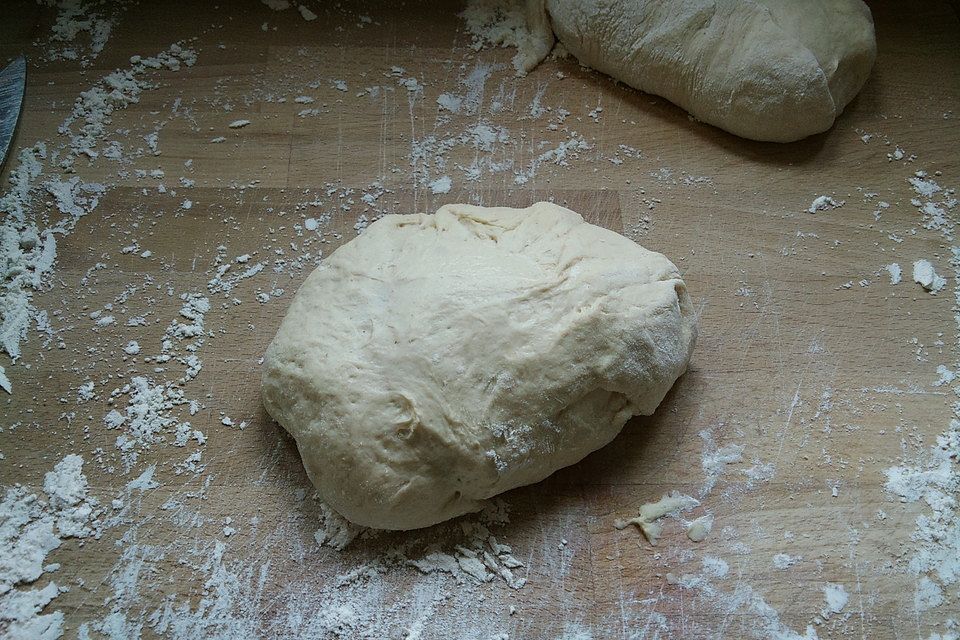 Grundrezept für einen feinen Dinkelpizzateig