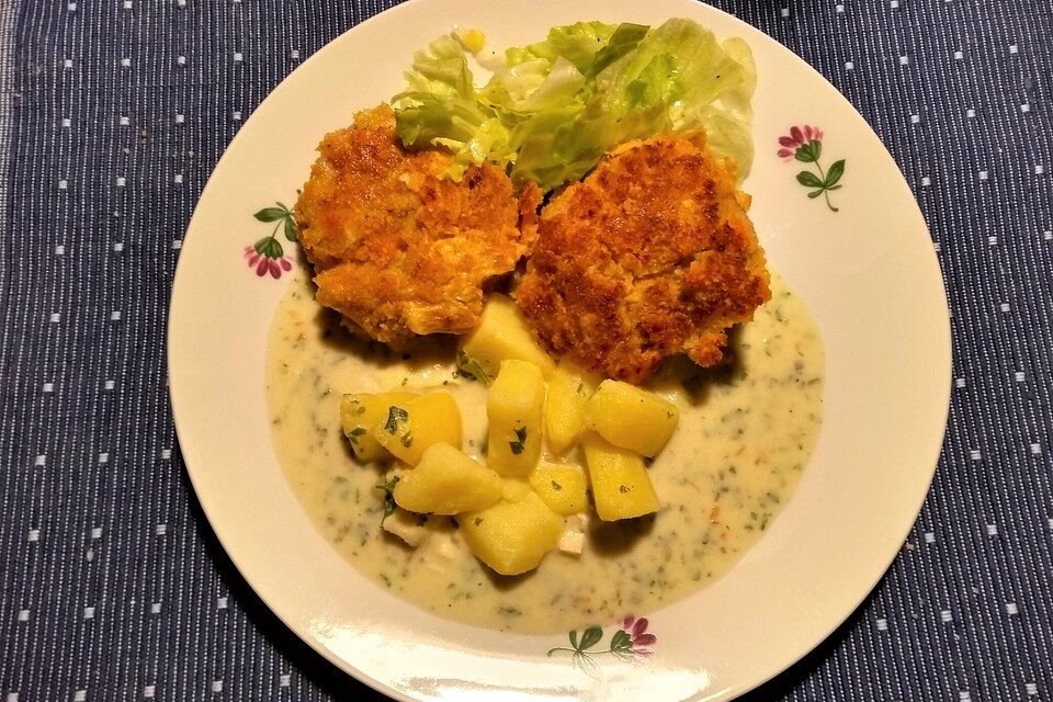 Schnitzel vom Schweinefilet in Gemüsepanade mit Käsekartoffeln