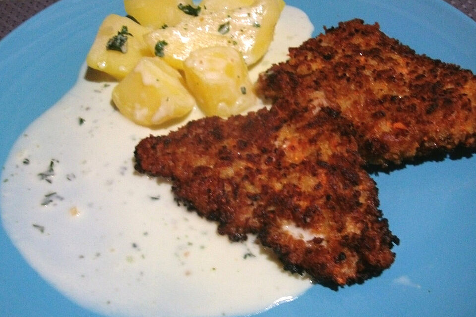 Schnitzel vom Schweinefilet in Gemüsepanade mit Käsekartoffeln