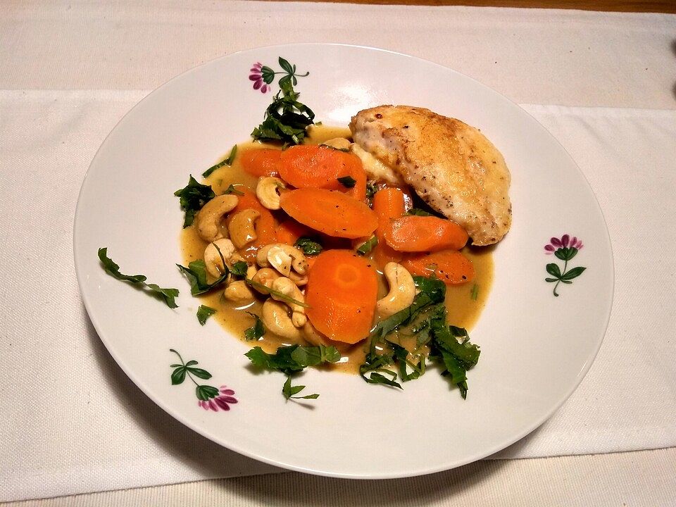 Parmesan-Mini-Putenschnitzel auf indischem Möhrengemüse von McMoe| Chefkoch