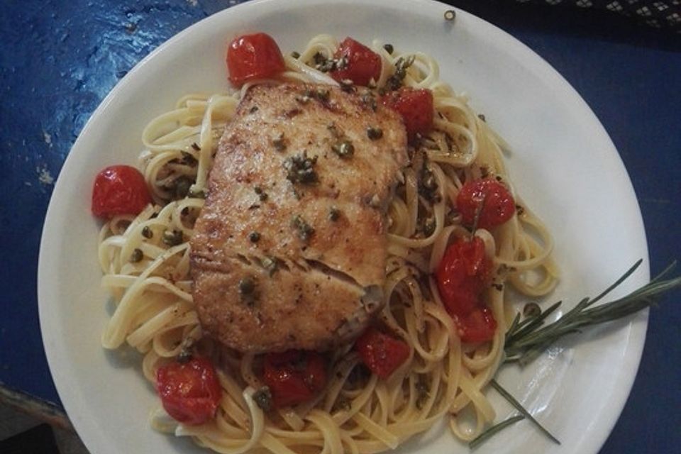 Fischfilet auf Pasta mit Orangen-Cherry-Tomaten und Vanillebutter