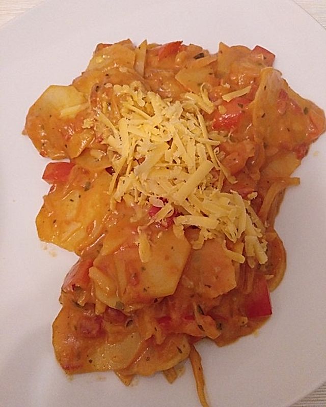 Fruchtige Kartoffelscheiben mit Zwiebel-Paprikagemüse