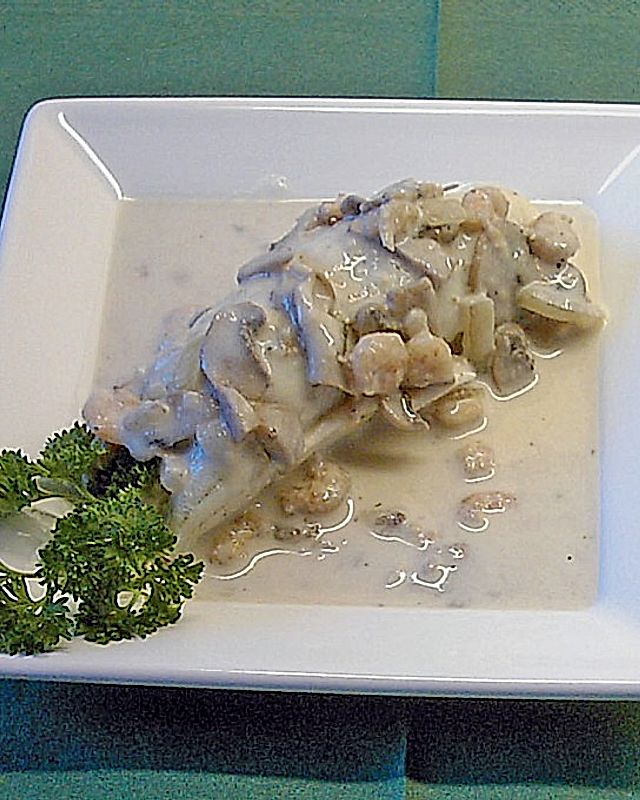 Fischröllchen in Pilz - Shrimps - Soße