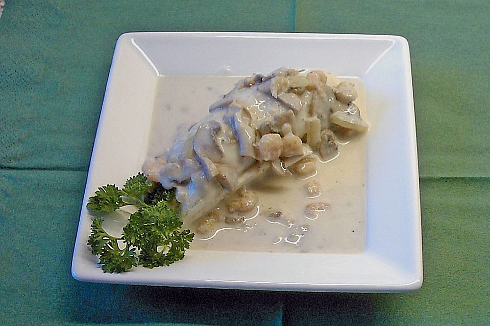 Fischröllchen in Pilz - Shrimps - Soße