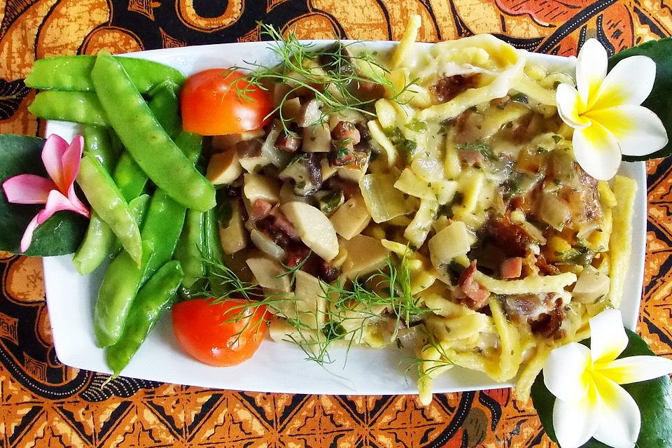 Kässpätzle mit Kräuterseitlingen und Zuckerschoten