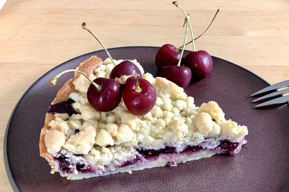 Saftiger Kirsch-Streusel-Kuchen mit Mürbeteig vom Blech