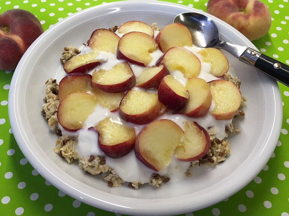 Müsli mit Fruchtjoghurt und frischem Pfirsich von Anaid55| Chefkoch