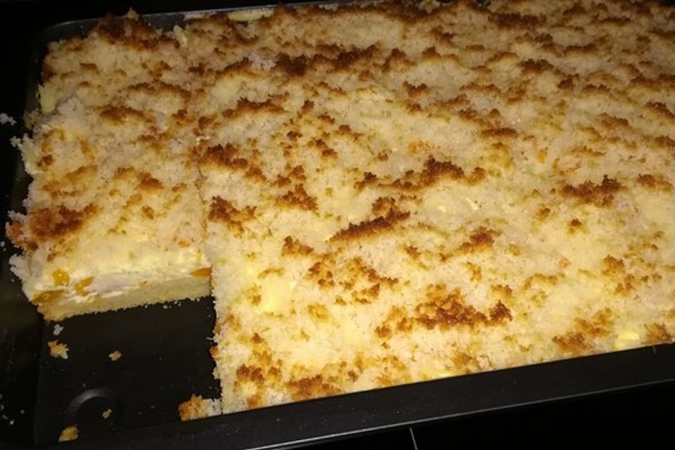 Mandarinen-Schmand-Kuchen mit Kokosstreuseln