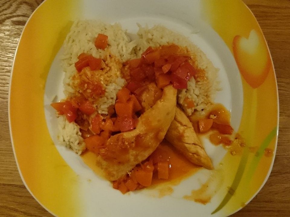 Hähnchenfilet in Tomaten-Paprika-Gemüse mit schmelzendem Reis von ...