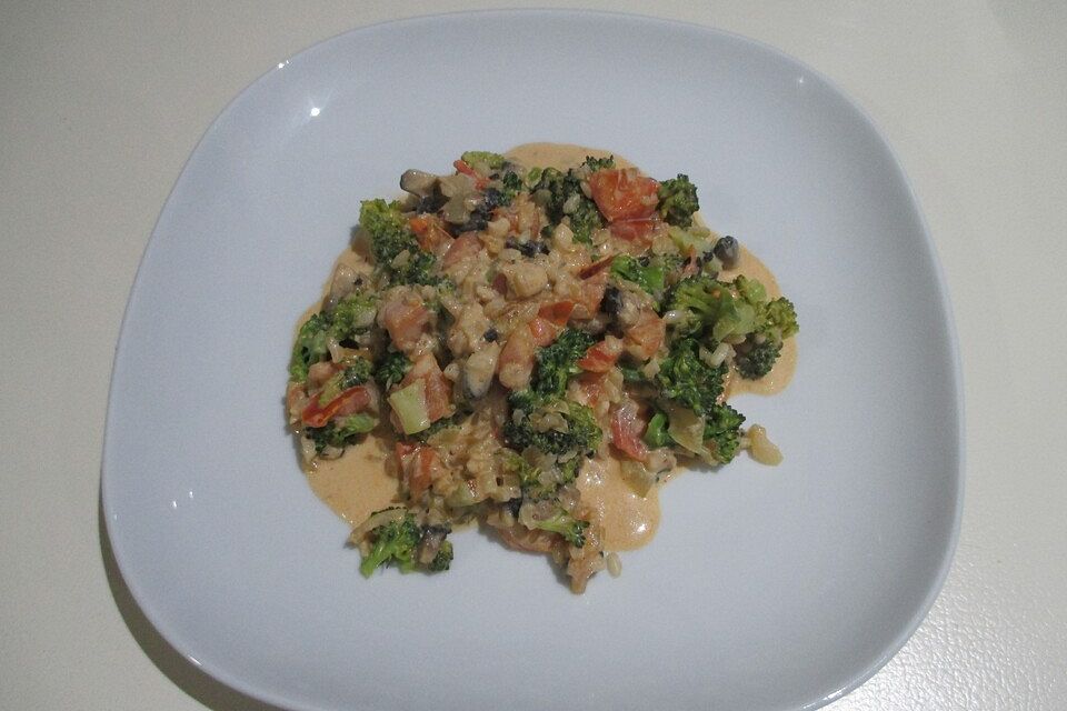 Champignon-Reispfanne mit Brokkoli und Tomaten