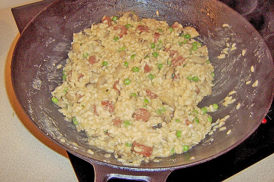 Risotto mit Salami und Erbsen