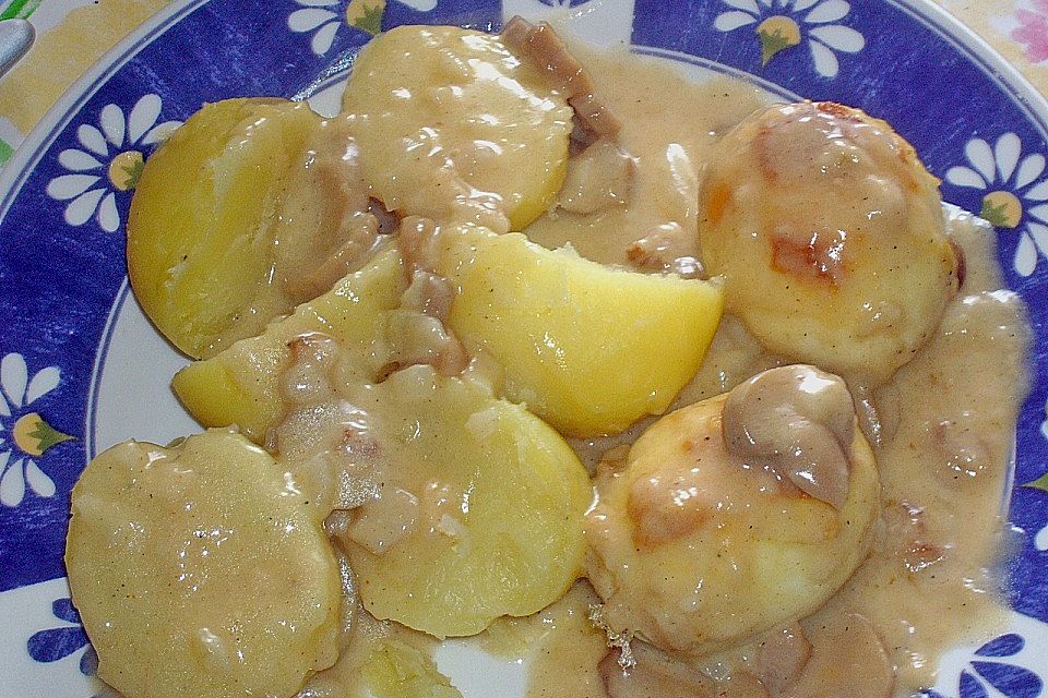 Überbackene Eier in Champignon - Rahmsauce