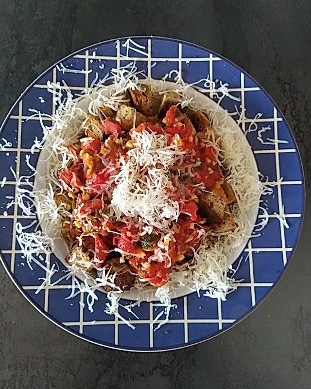 Sauerteigbrot mit Kräuter-Harissa-Tomaten