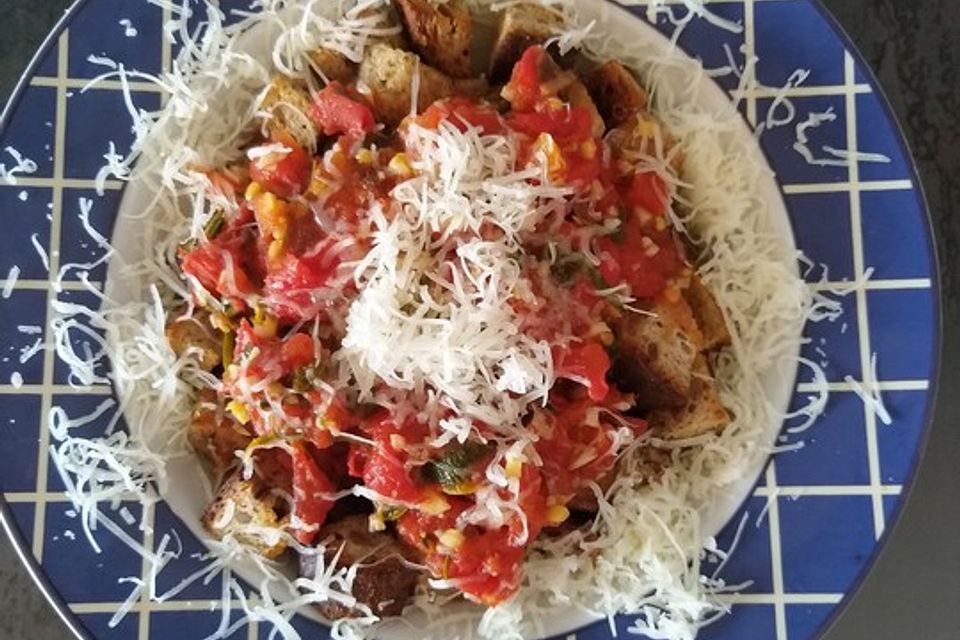 Sauerteigbrot mit Kräuter-Harissa-Tomaten