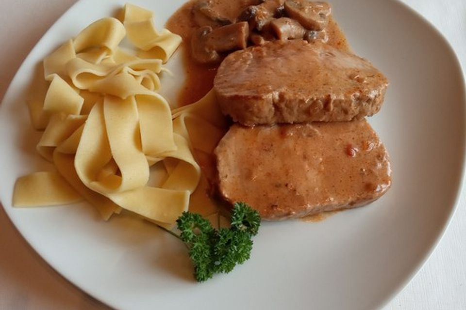 Schweinelachs mit Pilzen