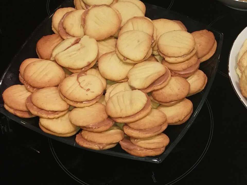 Orangen-Zimt-Plätzchen mit Karamellfüllung von Silviafuss| Chefkoch