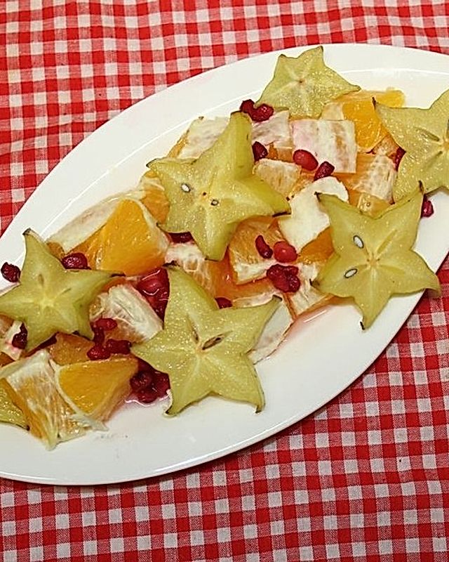Sternfrucht-Orangen-Granatapfel-Salat mit Orangensauce