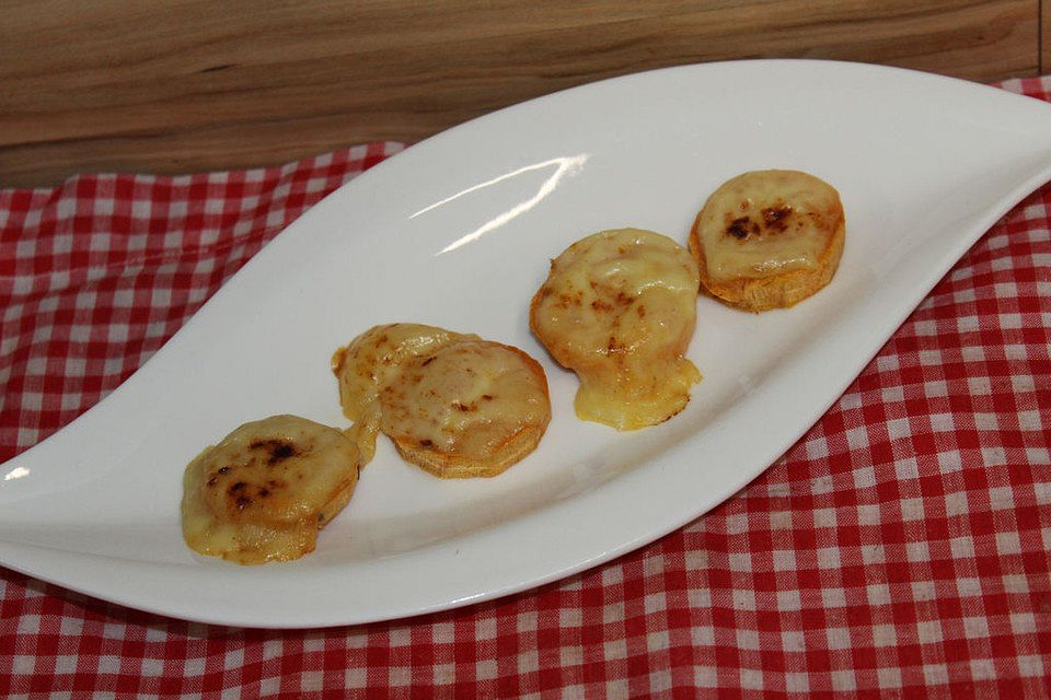 Würzige Süßkartoffeln mit Käse überbacken