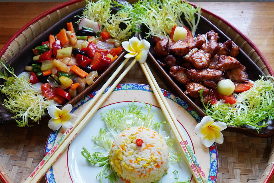 Schweinefleisch mit Melonen-Cap Cay und himmlischer Mandarin-Blütenreis