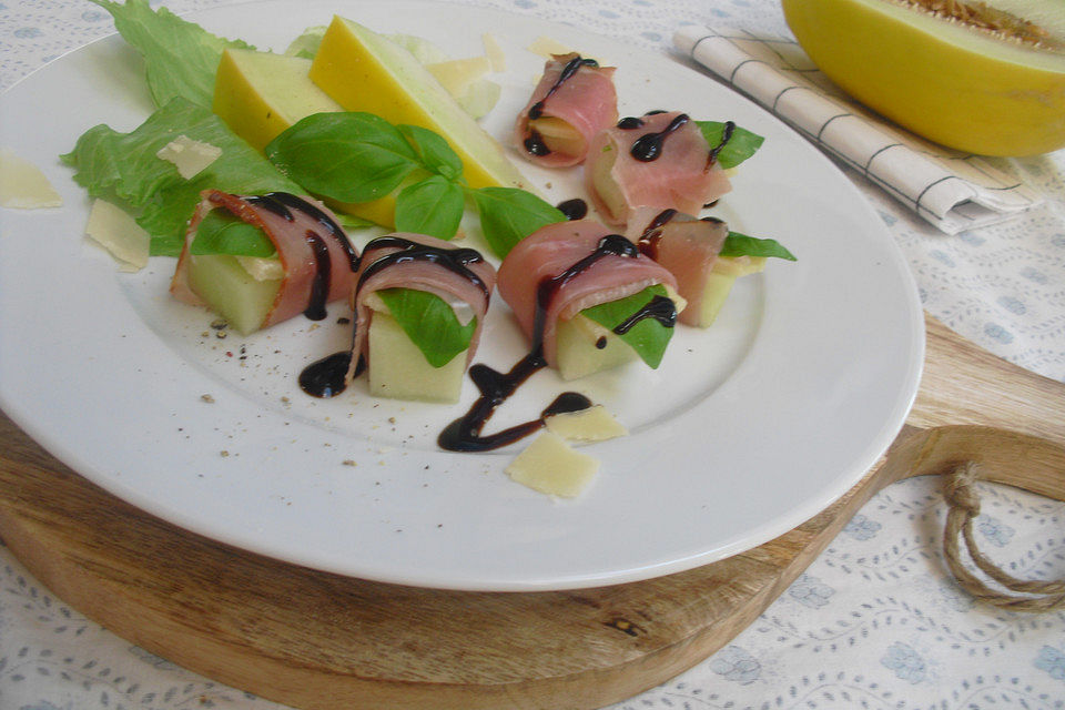 Melone mit Parmesan und Schinken