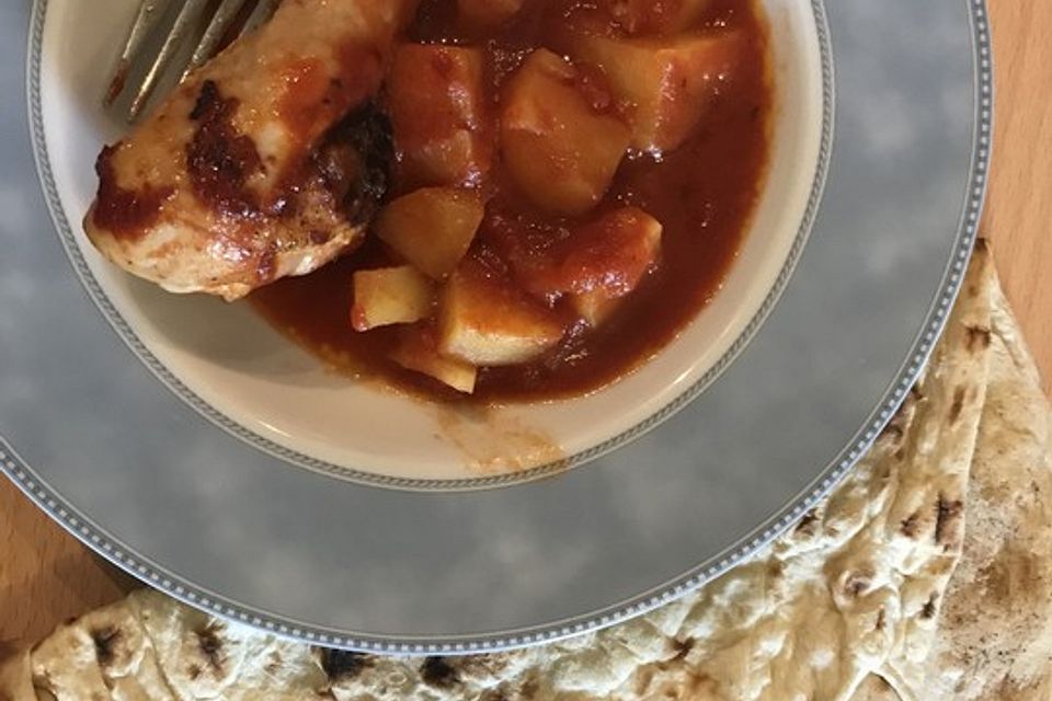 Hähnchenschenkel mit Tomatensoße