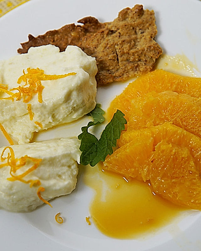 Zitronencreme auf Mandelcrunch mit Orangensalat und Karamellsauce
