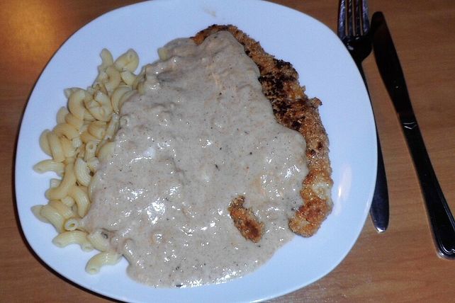 Pangasiusfilet mit Erdnusspanade, Hörnchennudeln und Erdnusssauce von ...