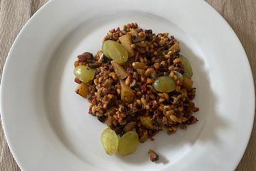 Römisches Getreiderisotto "Imst Gurgltal" mit Speck, Pilzen, Birne, Weinbeeren und Bergkäse