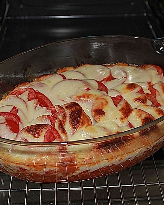 Schweinegeschnetzeltes mit Tomaten - Mozzarella - Haube
