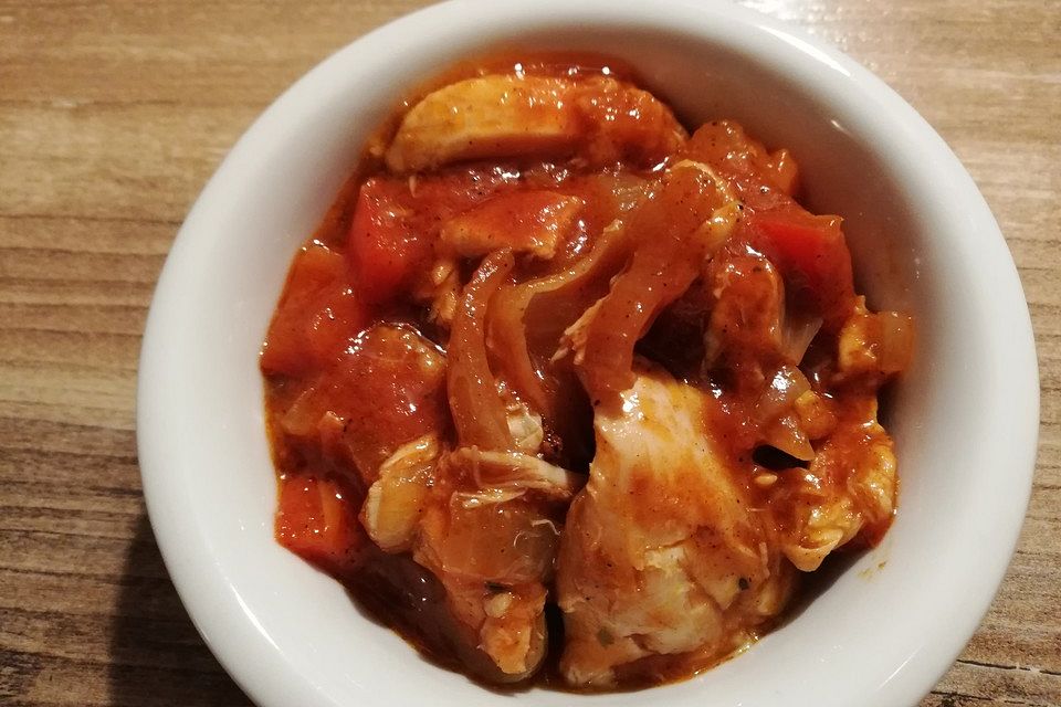 Afrikanisches Tomaten - Hähnchen mit Reis oder Couscous