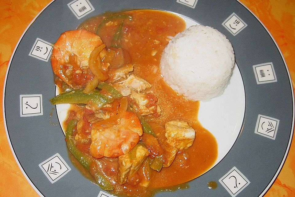 Brasilianische Fischpfanne mit Reis