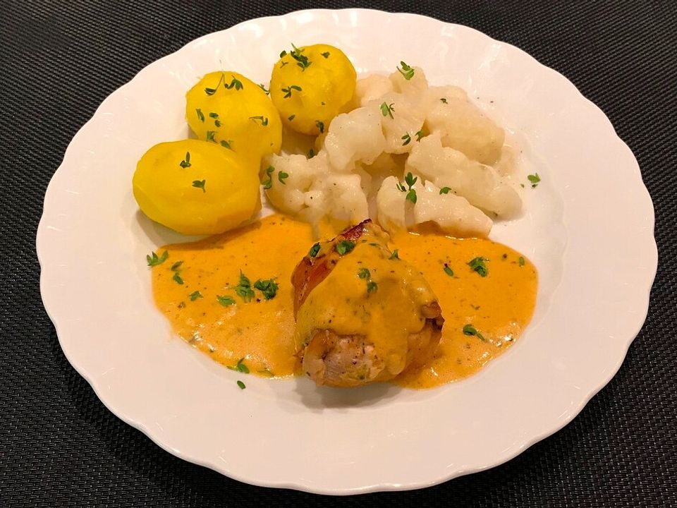 Putenmedaillons im Baconmantel, mit Curry-Sahnesauce überbacken von ...