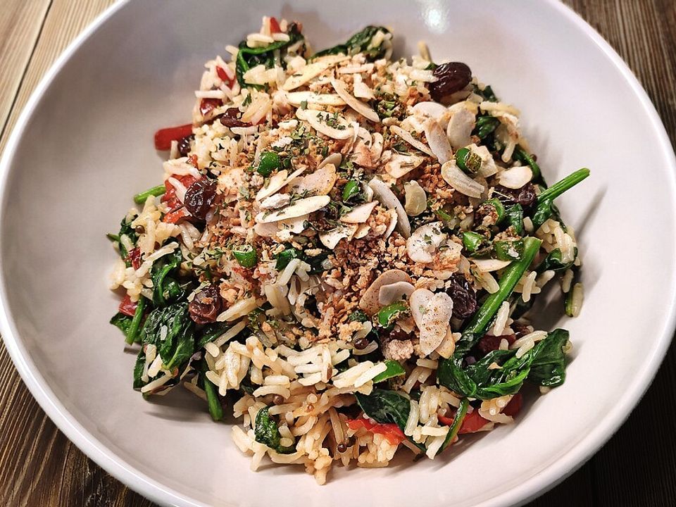 Orientalischer Zitronenreis mit Spinat, Paprika, Rosinen und Mandel ...