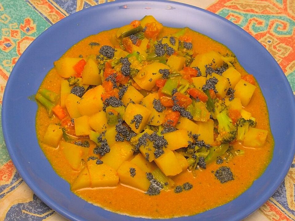 Indisches Kartoffelcurry mit Brokkoli, Tomate und Mohn von Tatunca ...