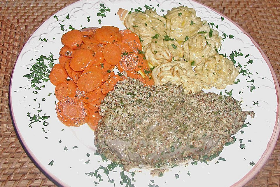 Pariser Rumpsteak mit Buttermöhren und Herzoginkartoffeln