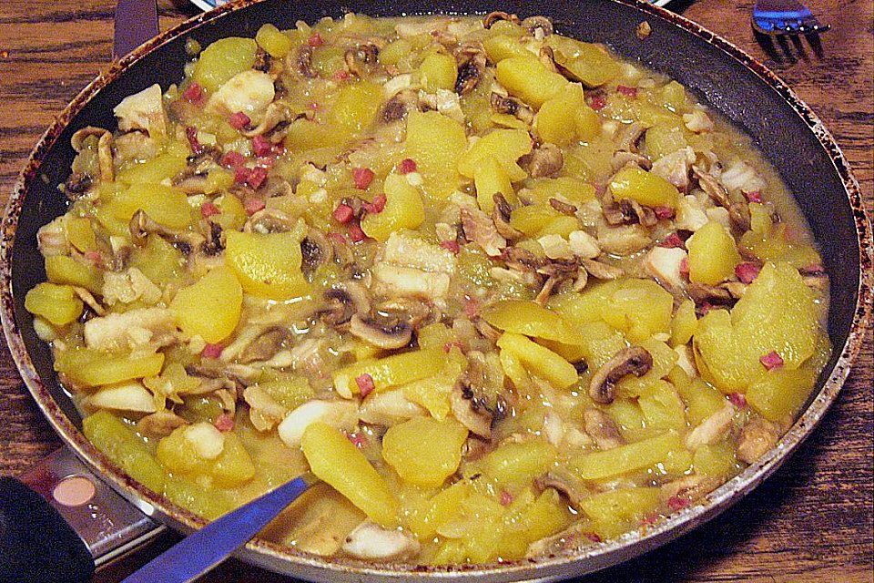 Fischpfanne mit Champignons