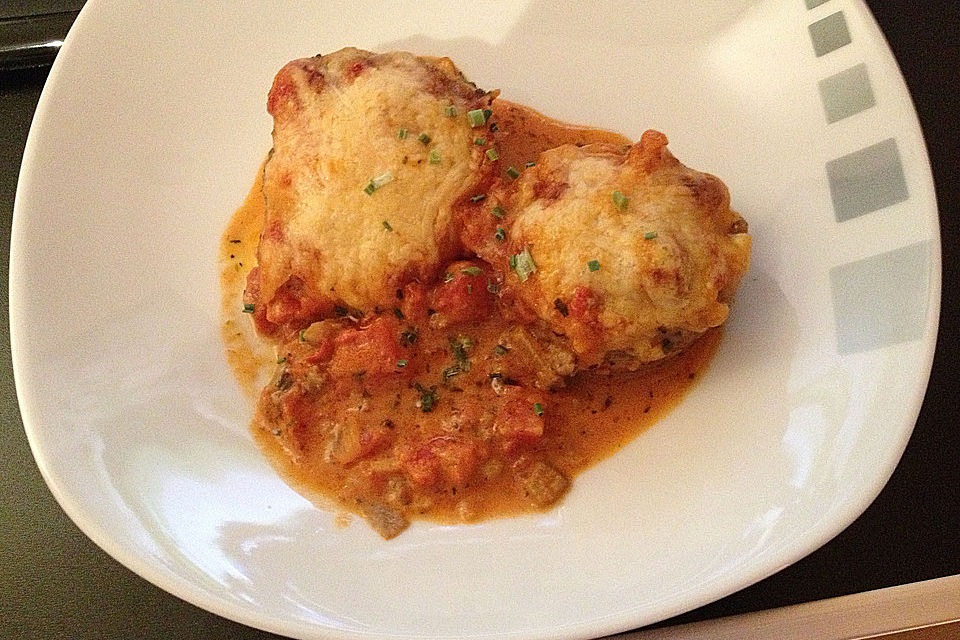 Gefüllte Champignons in Tomaten-Sahne