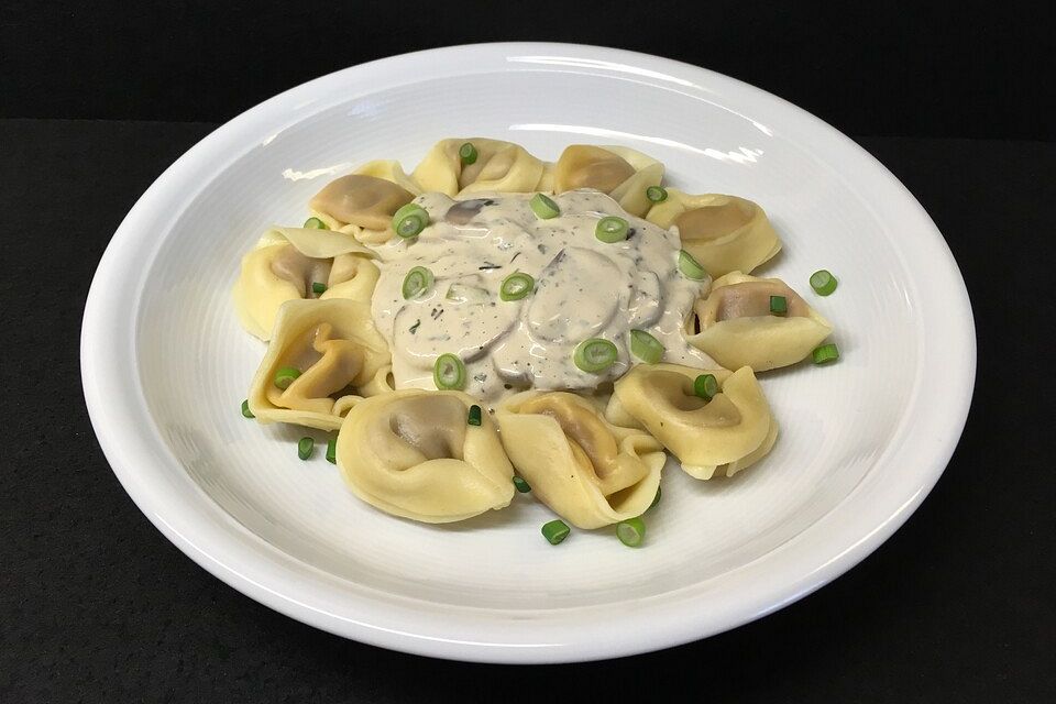 Käse - Sahne Pastasauce mit Champignons