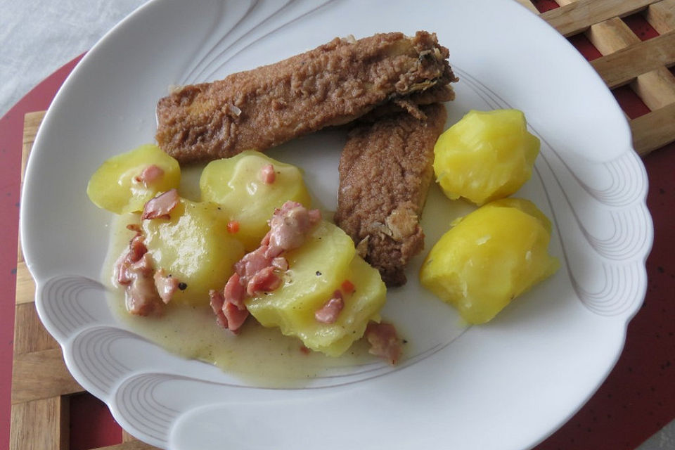 Hering mit Speck- und Zwiebelsauce