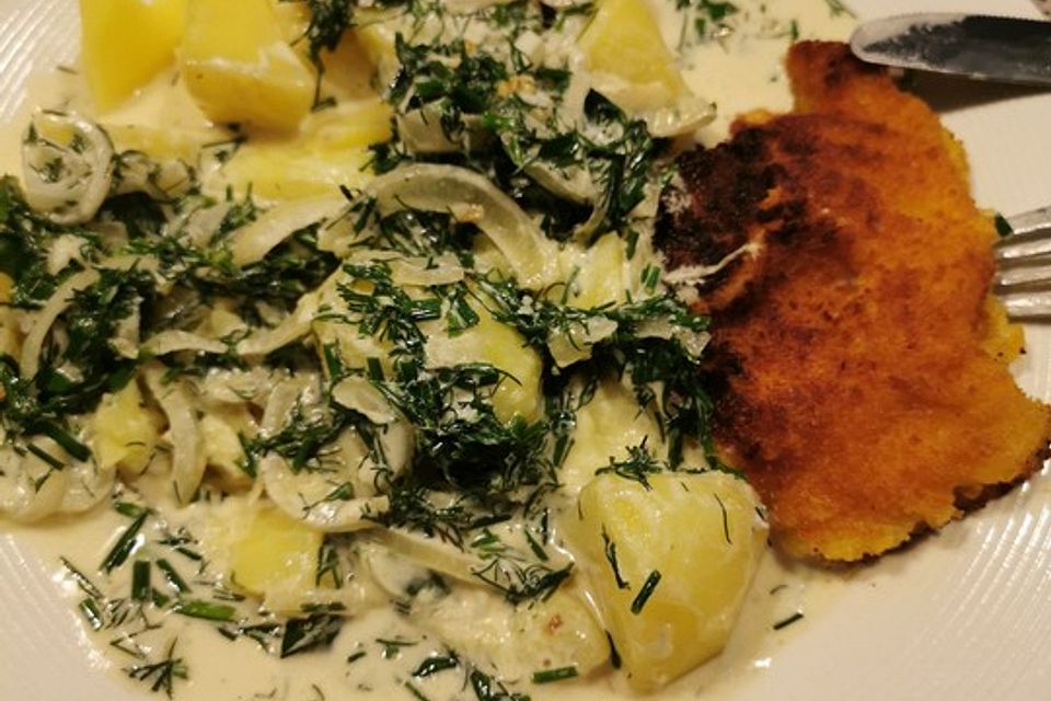 Schnitzel in Kräutersauce