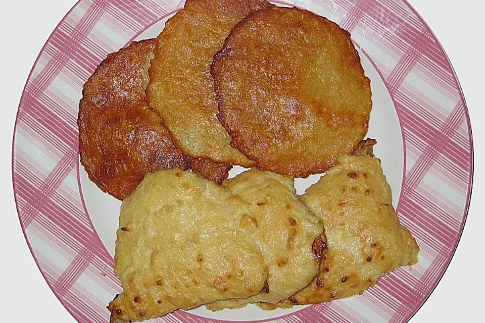 Putenschnitzel mit Zwiebel - Käsesauce