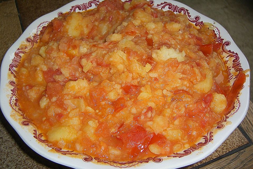 Batatas com tomatada