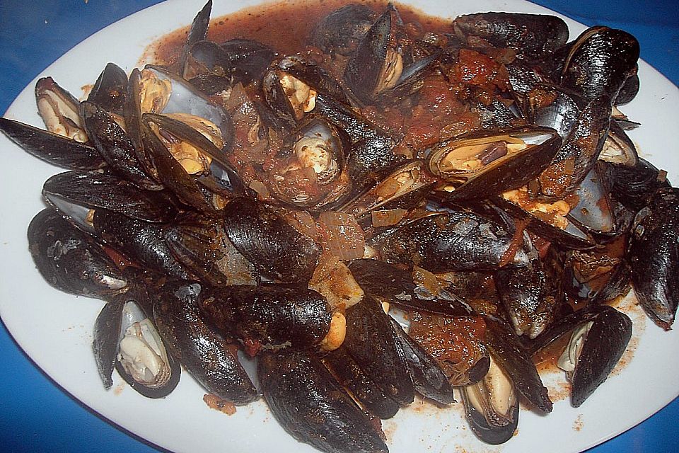 Venusmuscheln mit Tomaten