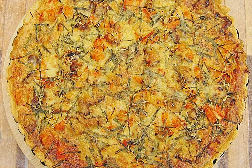 Quiche mit Flusskrebsschwänzen und frischen Champignons