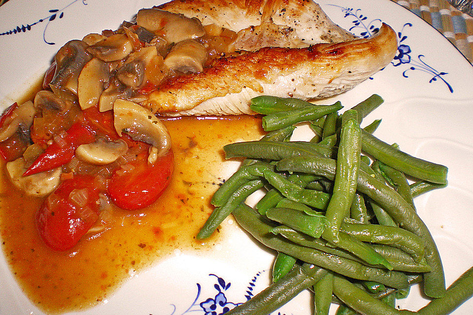 Zitronenschnitzel mit Champignons