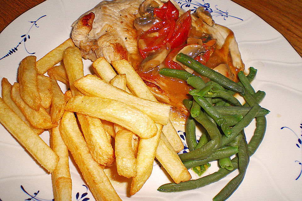 Zitronenschnitzel mit Champignons