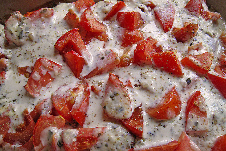 Fischfilet-Gratin mit Porree und Tomaten