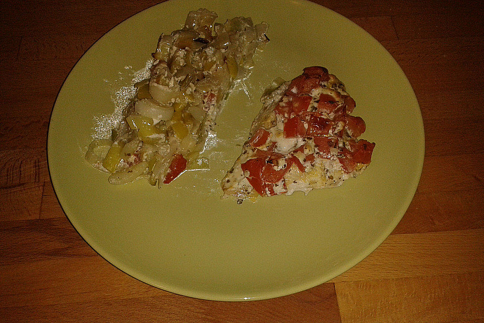 Fischfilet-Gratin mit Porree und Tomaten