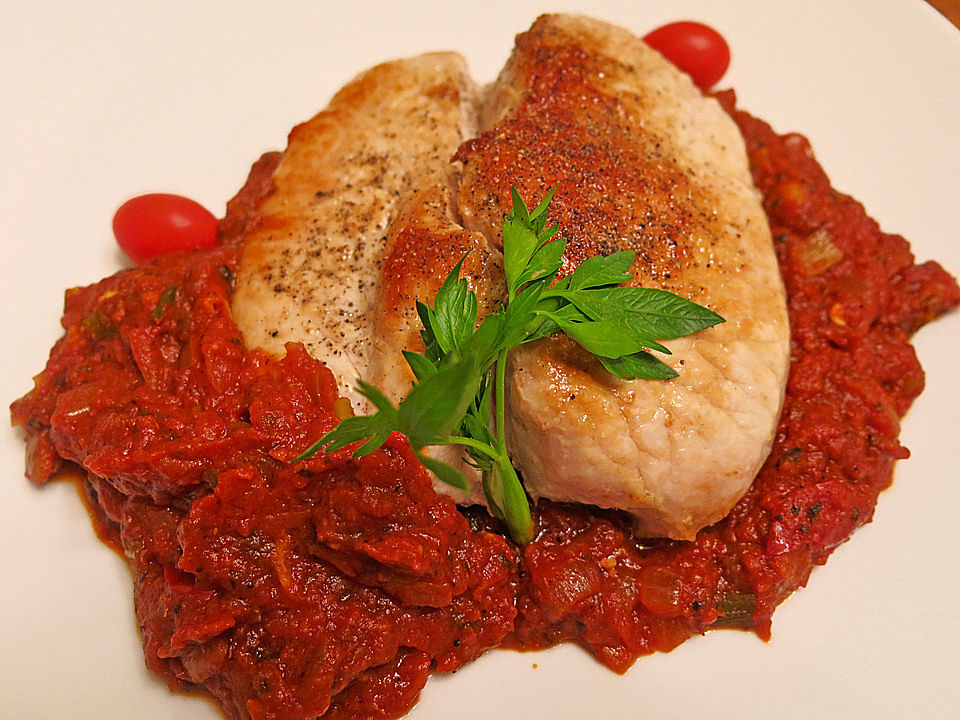 Schweinekoteletts mit Tomaten und Knoblauch von judith| Chefkoch